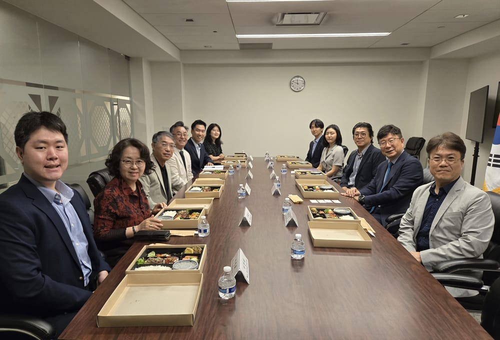 Eleven KAMDA leaders and Consulate staff seated along a conference table at the Consulate General of Korea in New York.